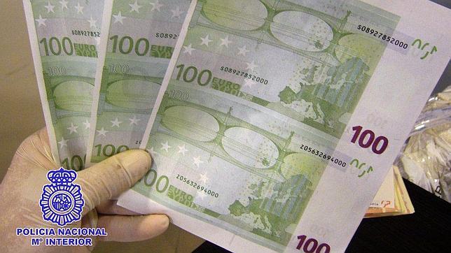 Cae una red que falsificaba billetes y dólares para distribuirlos en España