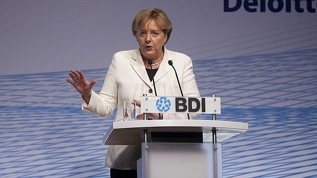 Merkel pone como ejemplo la reforma constitucional de España