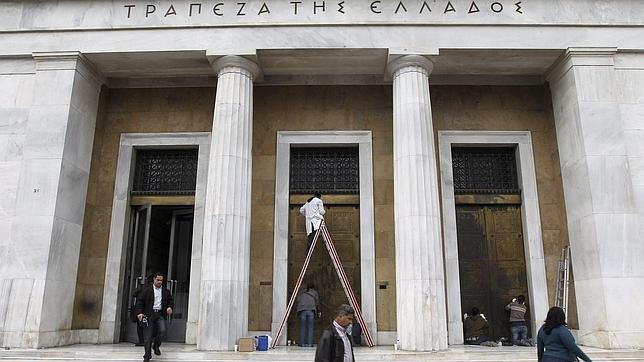 Alivio en Atenas después de que el 95,7% de los acreedores acepte perdonar la deuda