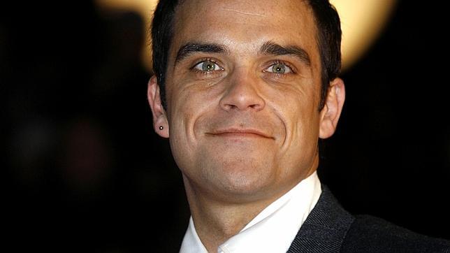 Robbie Williams anuncia entre lágrimas que va a ser padre