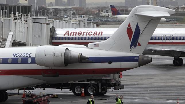 US Airways se fusionará con American Airlines, en proceso de bancarrota