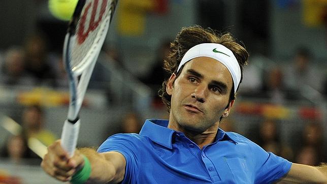 Federer sobrevive a Raonic