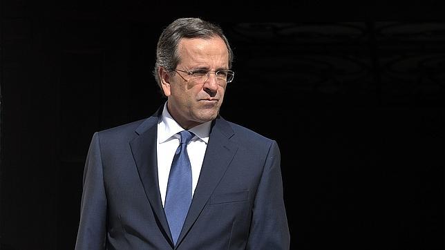 Samaras advierte de que los mercados castigarán a otros países si Grecia sale del euro