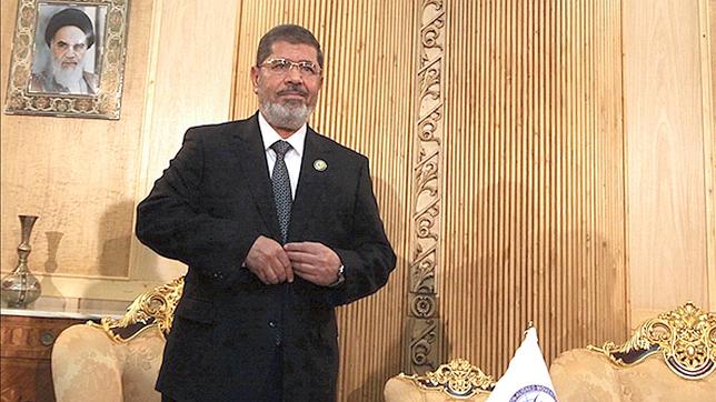 Mursi critica a El-Asad y los sirios abandonan la sala