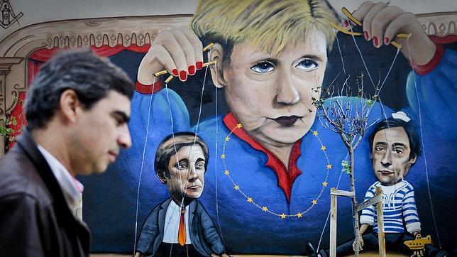 Merkel visita un Portugal dividido entre el repudio y la admiración