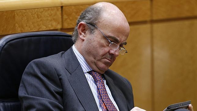 De Guindos: «España está en el camino correcto y corrigiendo problemas»