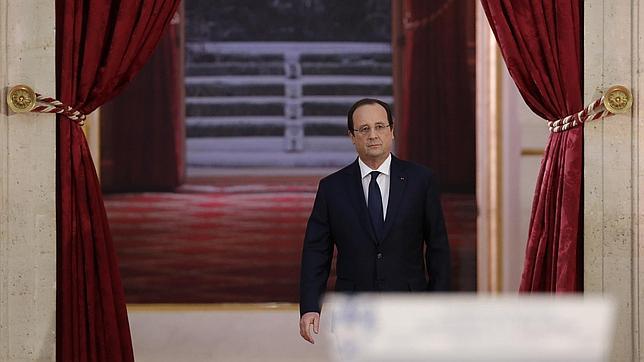 Hollande no habla de su vida privada, pero anuncia un recorte de 65.000 millones