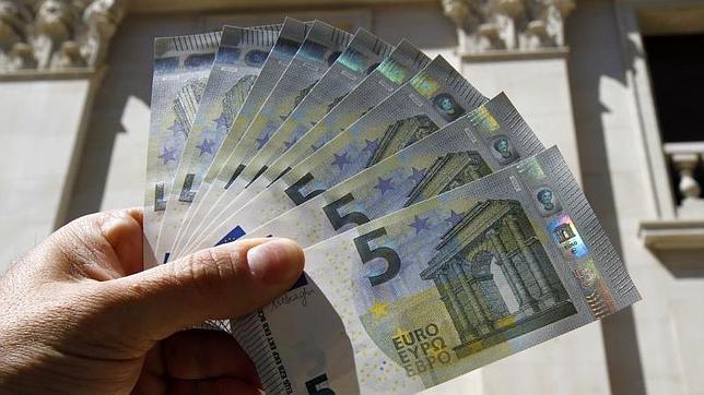 La negociación colectiva arranca 2014 con una subida salarial media del 0,60%