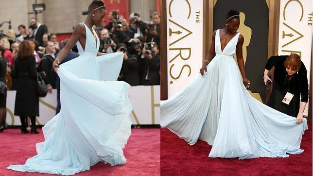 Dos momentos de Lupita sobre la alfombra roja luchando con el vuelo de su falda