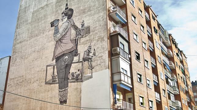 Dibujo realizado en una medianería de Marqués de Viana por el artista urbano San