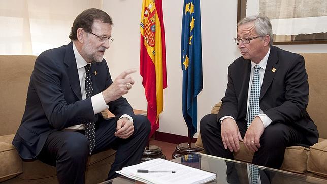 Rajoy y Juncker, durante una cumbre en Bruselas
