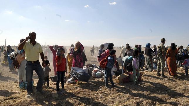 Más de 45.000 kurdos cruzan la frontera de Siria con Turquía en una sola noche