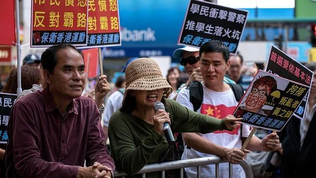 Pekín prohíbe la entrada en China a los líderes del movimiento estudiantil de Hong Kong