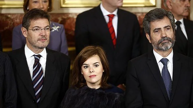 La vicepresidenta, junto a Catalá y Lesmes