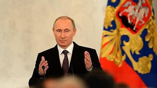 Vladímir Putin, el 18 de marzo en el Kremlin, tras firmar el documento de la adhesión de Crimea