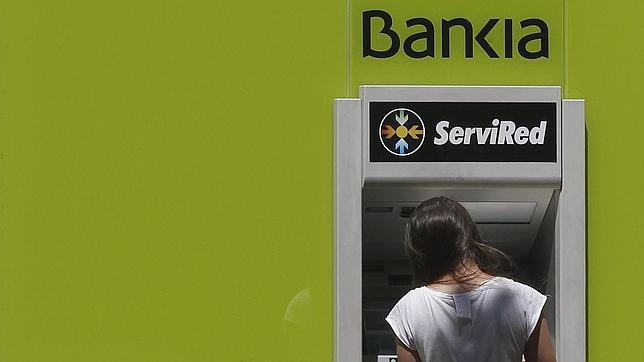 España devolverá en julio 2.500 millones del rescate a la banca