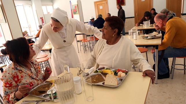 La Iglesia católica asistió a 4,1 millones de personas en 2013