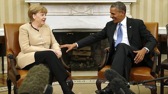 Obama junto a Merkel, en una reciente reunión para tratar la crisis de Ucrania