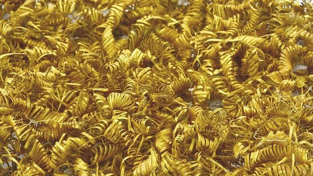 Miles de pequeñas espirales de oro de los sacrificios de la Edad de Bronce