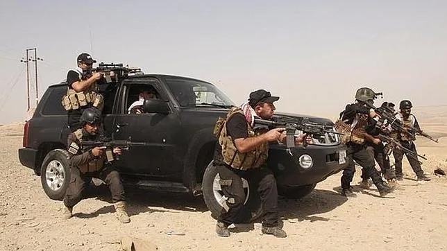 Guerreros kurdos peshmerga, en un entrenamiento para enfrentarse al Estado Islámico en Zummar, en Irak