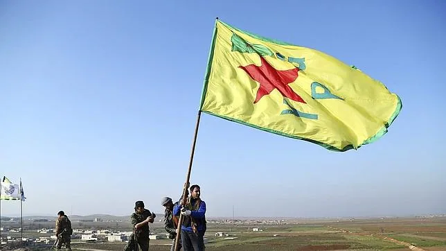 Combatientes kurdos celebran la reconquista de Kobani