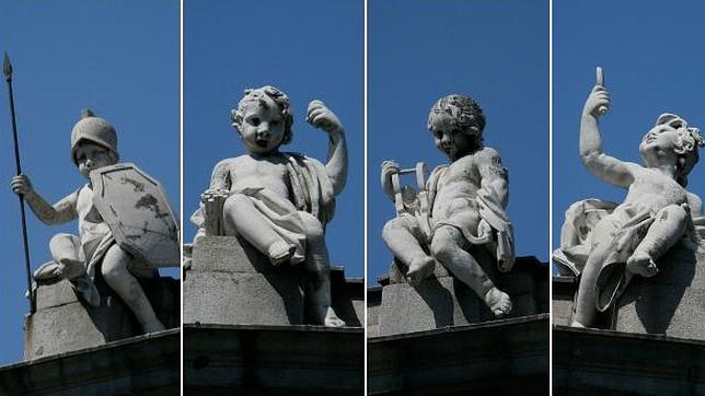 El mensaje que Carlos III ocultó al colocar a cuatro niños «putto» sobre la Puerta de Alcalá