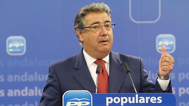 Zoido afirma que Griñán «tendrá que sentarse ante un juez»