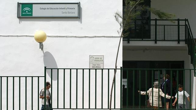 En clase con bufanda y abrigo en Cerro Muriano