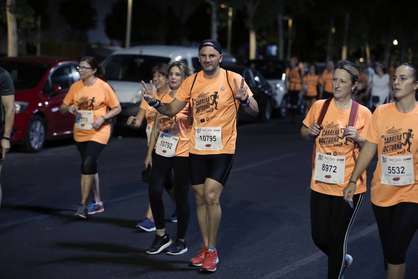 Más de 20.000 corredores inundan Sevilla en la KH-7 Carrera Nocturna 2019