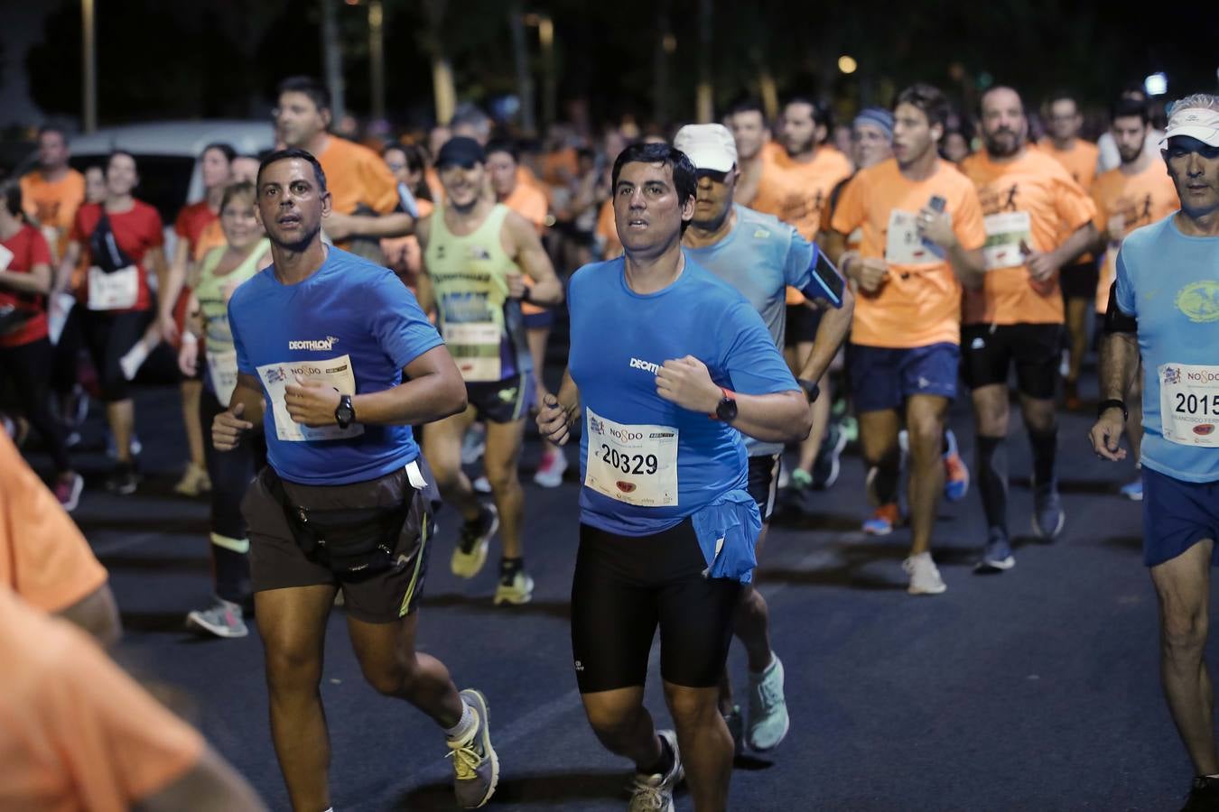 Más de 20.000 corredores inundan Sevilla en la KH-7 Carrera Nocturna 2019