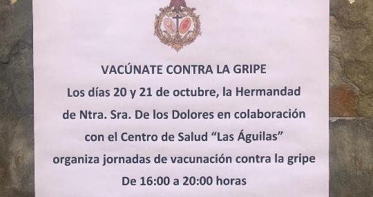 Cartel de la hermandad del Cerro del Águila informando sobre la vacuna