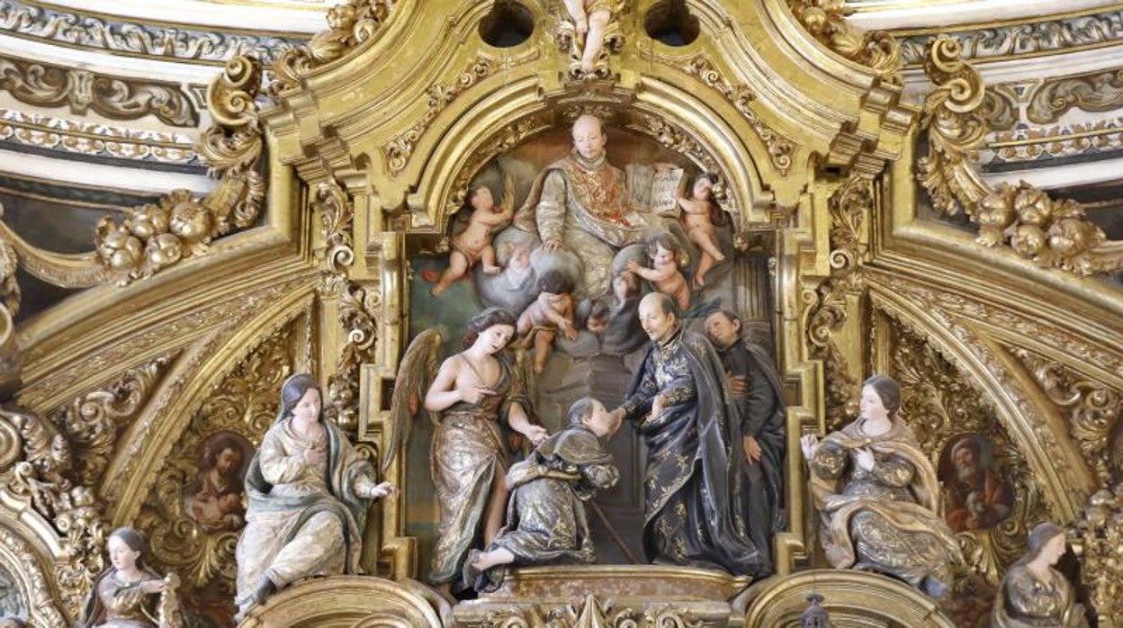 Relieve del ático de la capilla doméstica de los novicios: San Estanislao de Kostka pide permiso al general de la Compañía para entrar en la orden con San Ignacio contemplando desde el cielo