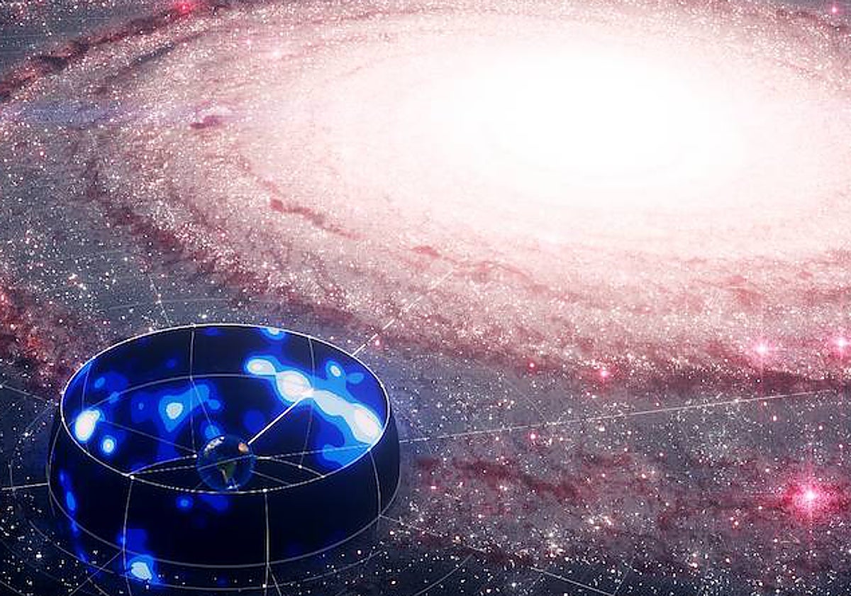 La vista de neutrinos (mapa de cielo azul) frente a la impresión de un artista de la Vía Láctea.