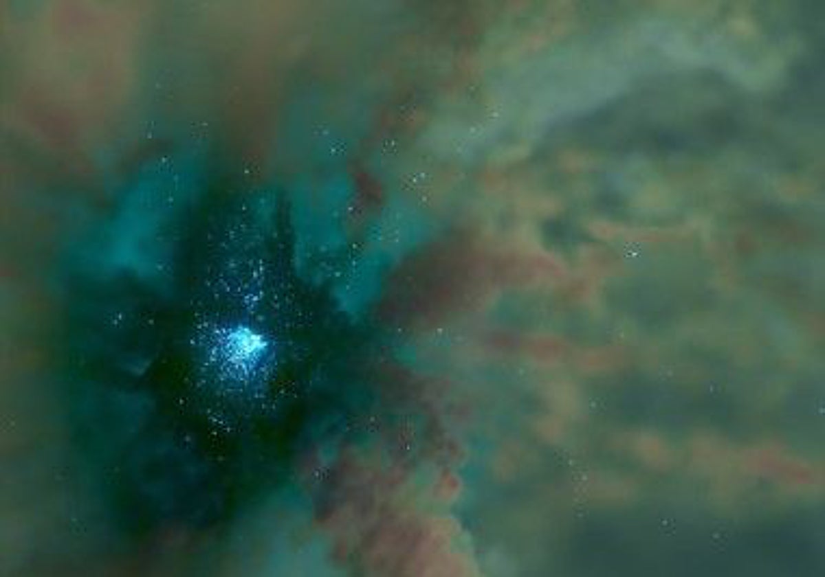 Un cúmulo de estrellas formándose en una nube molecular gigante reproducida por la simulación. Los puntos azules representan estrellas individuales. Los colores oscuros y brillantes indican las temperaturas del gas (frío y caliente)