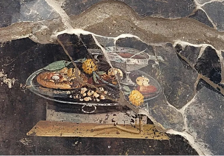 Fresco aparecido en Pompeya con un antepasado de la pizza