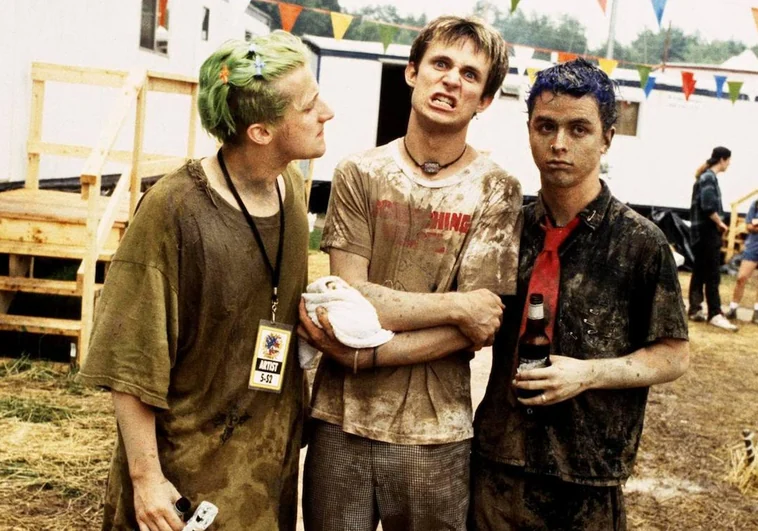 Green Day, cubiertos de barro tras su actuación en Woodstock