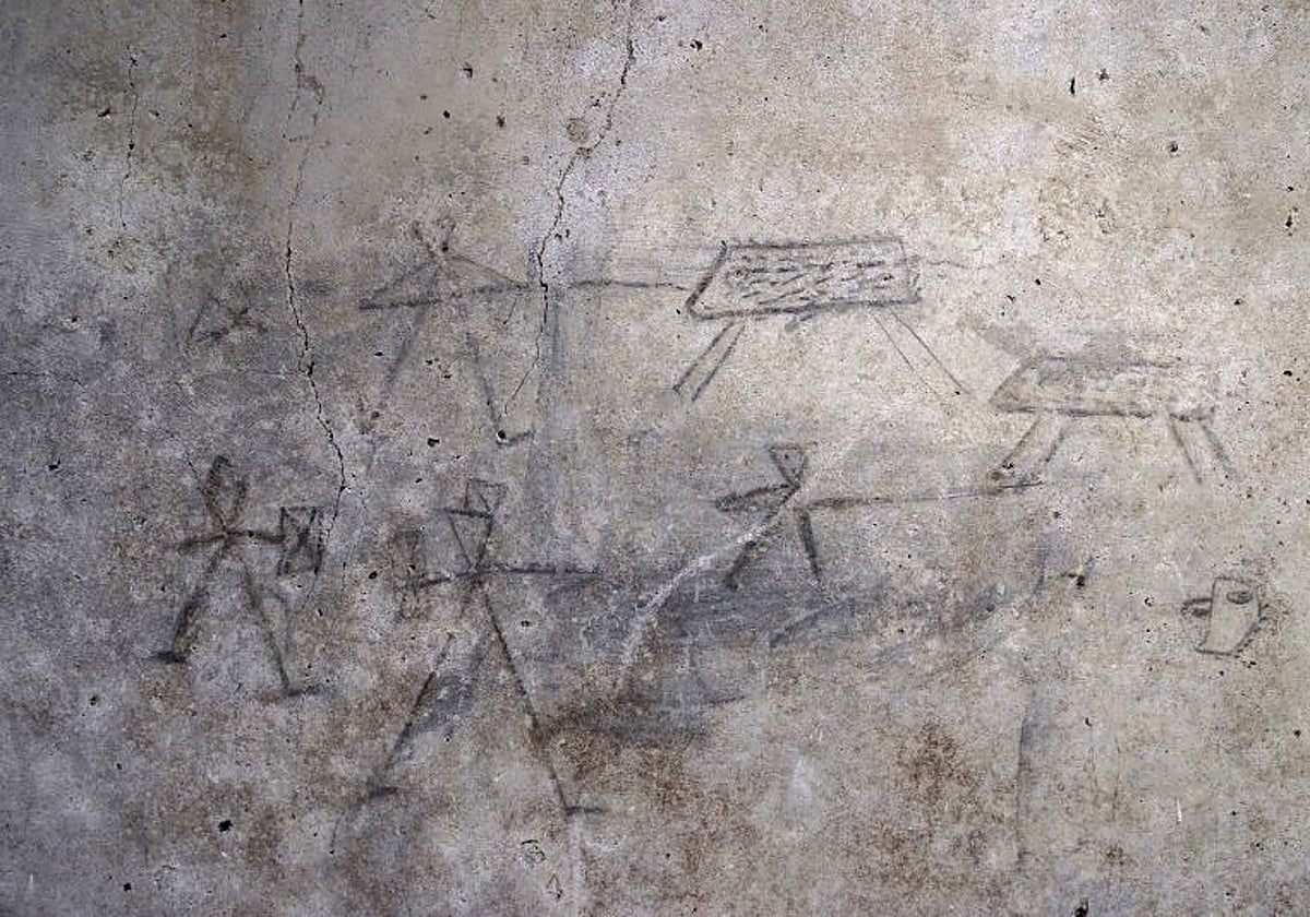 Dibujos de gladiadores realizados por niños de Pompeya