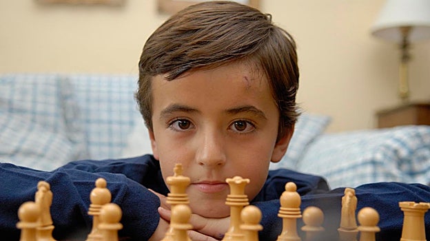 Imagen antes - Dos imágenes de Jaime Santos ante el tablero, con 15 años de diferencia