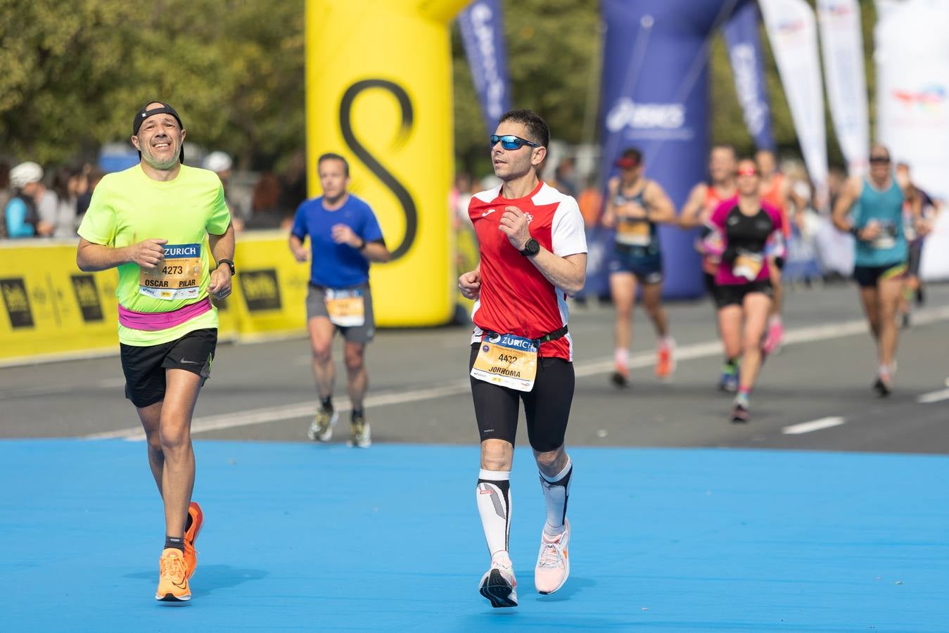 Diferentes momentos del Zurich Maratón Sevilla 2023