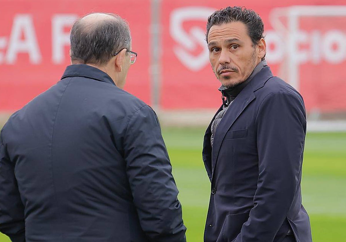 José María del Nido Carrasco y José Castro, éste de espaldas, en un entrenamiento reciente del Sevilla