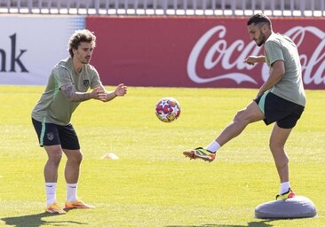 Griezmann y Koke, en el entrenamiento de ayer del Atlético de Madrid