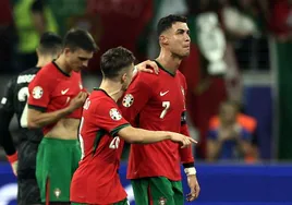 Cristiano, desconsolado tras fallar un penalti durante la prórroga del Portugal-Eslovenia