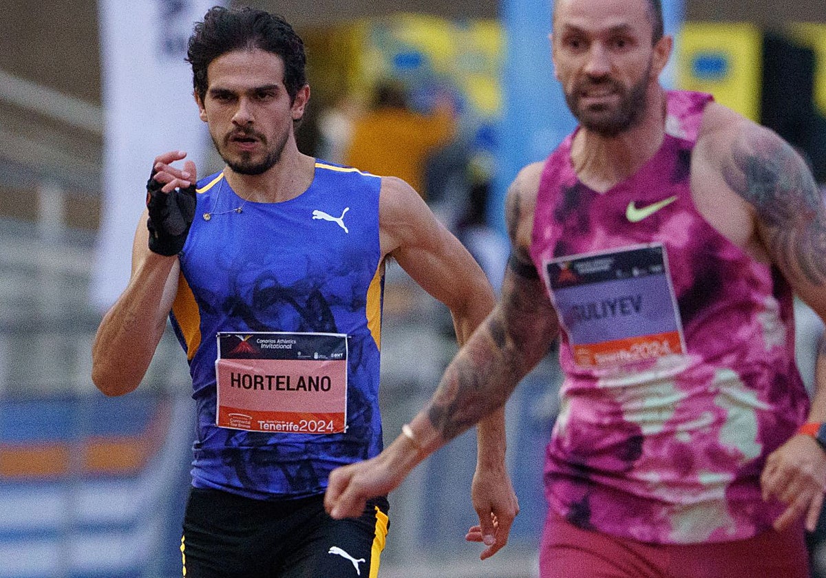 Bruno Hortelano (i), durante la prueba de 200 metros lisos en el encuentro de atletismo internacional Canarias Athletics Invitational en Tenerife
