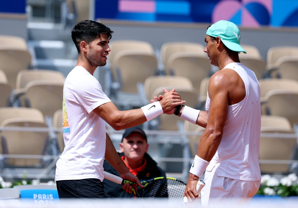 Alcaraz y Nadal, durante un entrenamiento