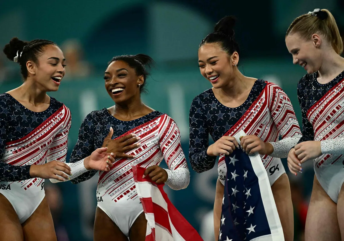 Las gimnastas estadounidenses, felices tras conquistar el oro