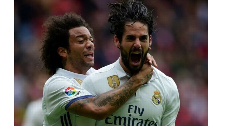 Marcelo e Isco celebran un gol durante su etapa en el Real Madrid