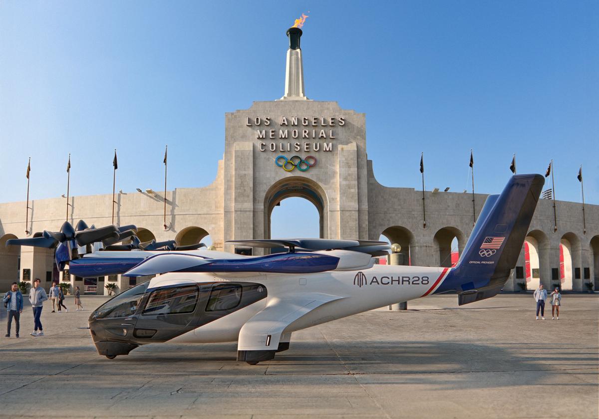 Un avión de la compañía delante de Los Angeles Memorial Coliseum