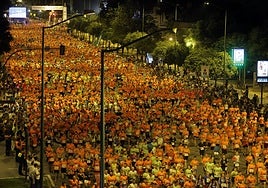En puertas de la Carrera Nocturna de Sevilla más multitudinaria de la historia