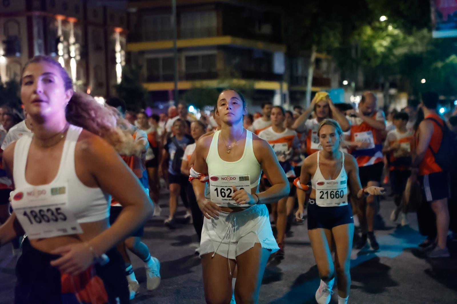 Búscate en la galería de imágenes de ABC de la Carrera Nocturna de Sevilla 2025