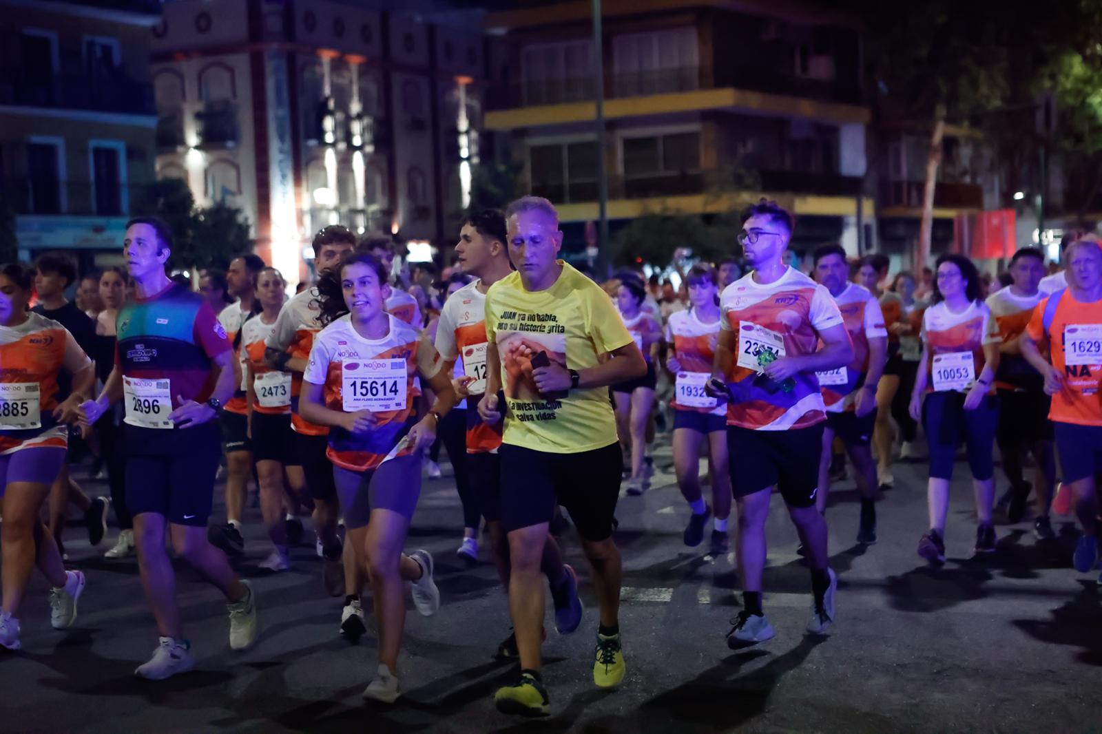 Búscate en la galería de imágenes de ABC de la Carrera Nocturna de Sevilla 2025